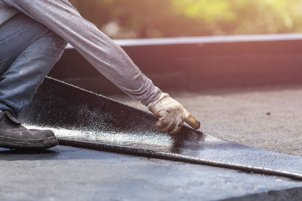 Professional Basement Waterproofing technician working in Westmoreland, TN